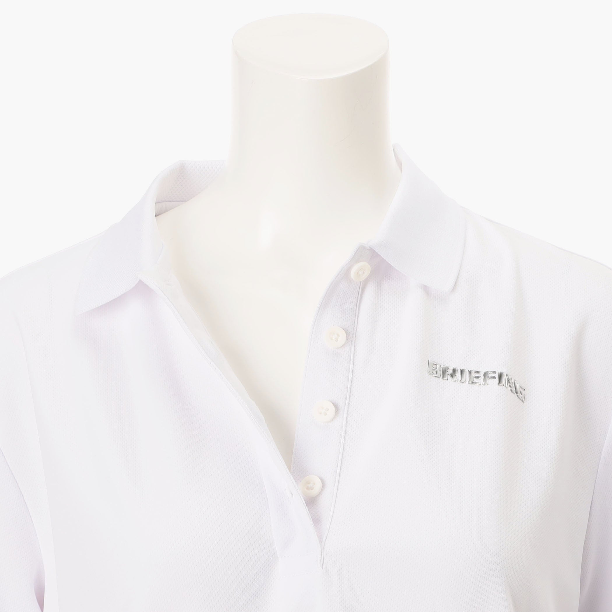 WOMEN’S BACK FLARE POLO