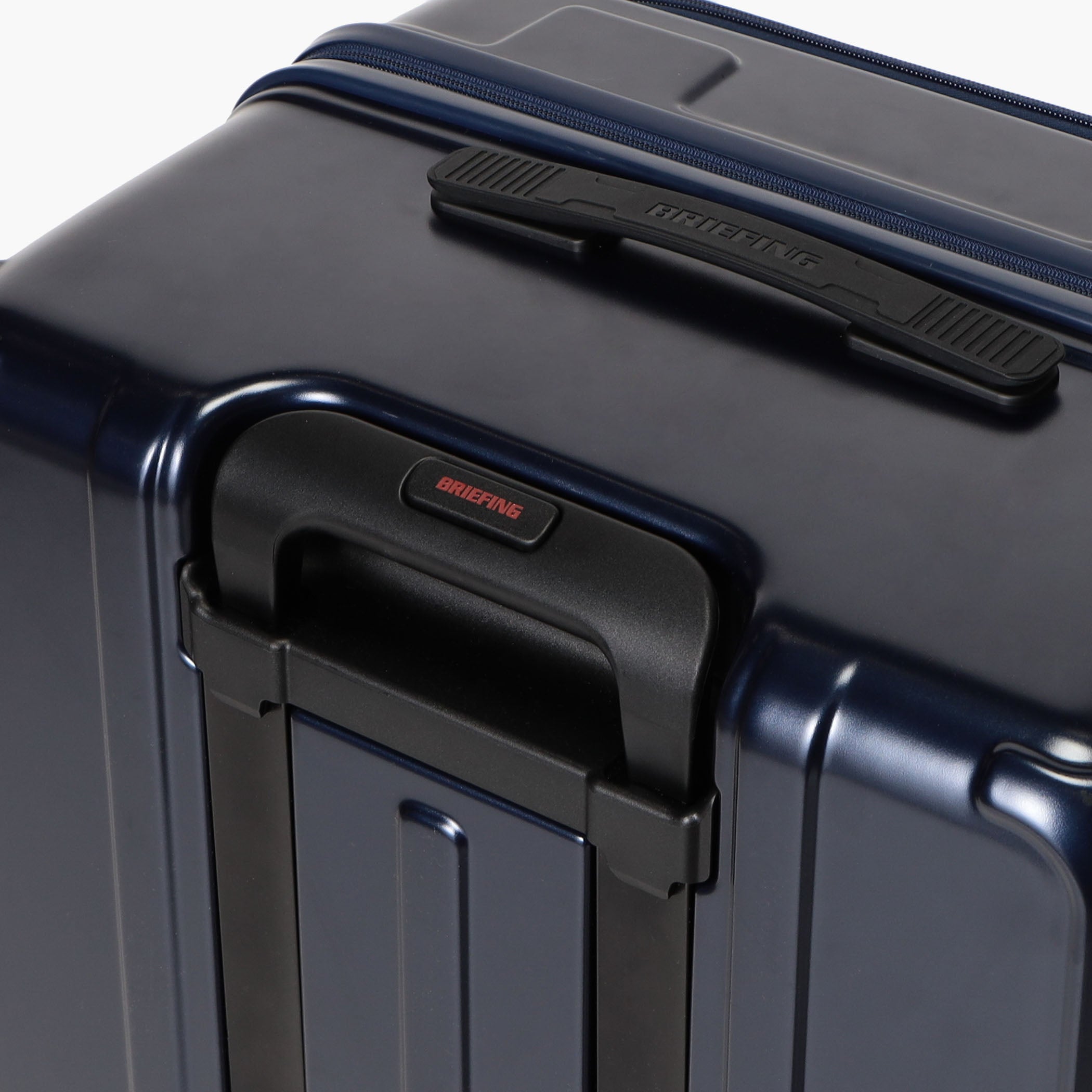 H 90T SD Polycarbonate Travel Suitcase - BRIEFING Official
