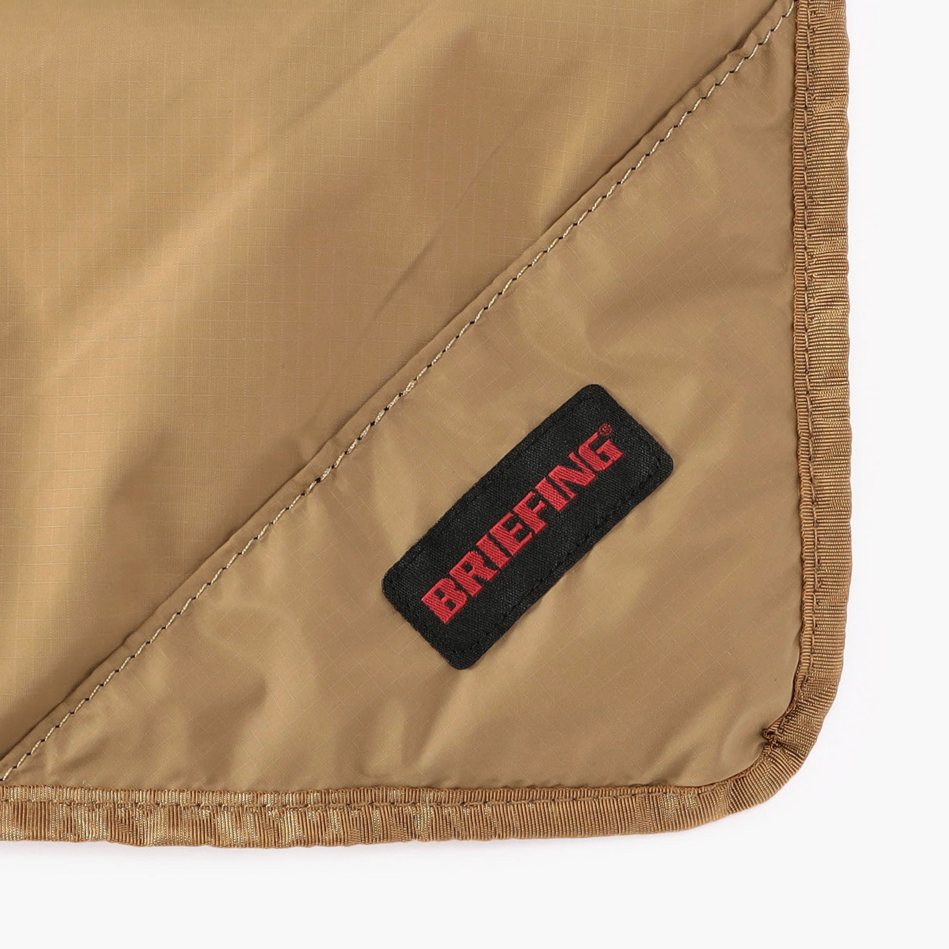 BRIEFING ALL OVER LOGO PRINTED CUSHION COVER, Goods, Outdoor