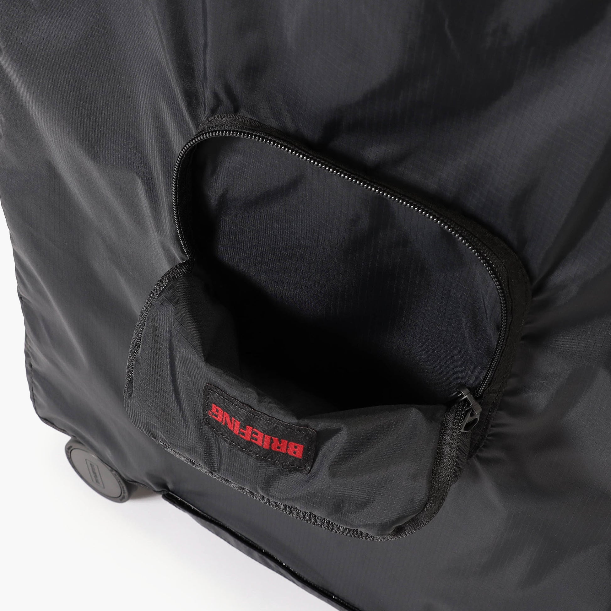 BRIEFING LUGGAGE COVER 01 M, Travel, Travel