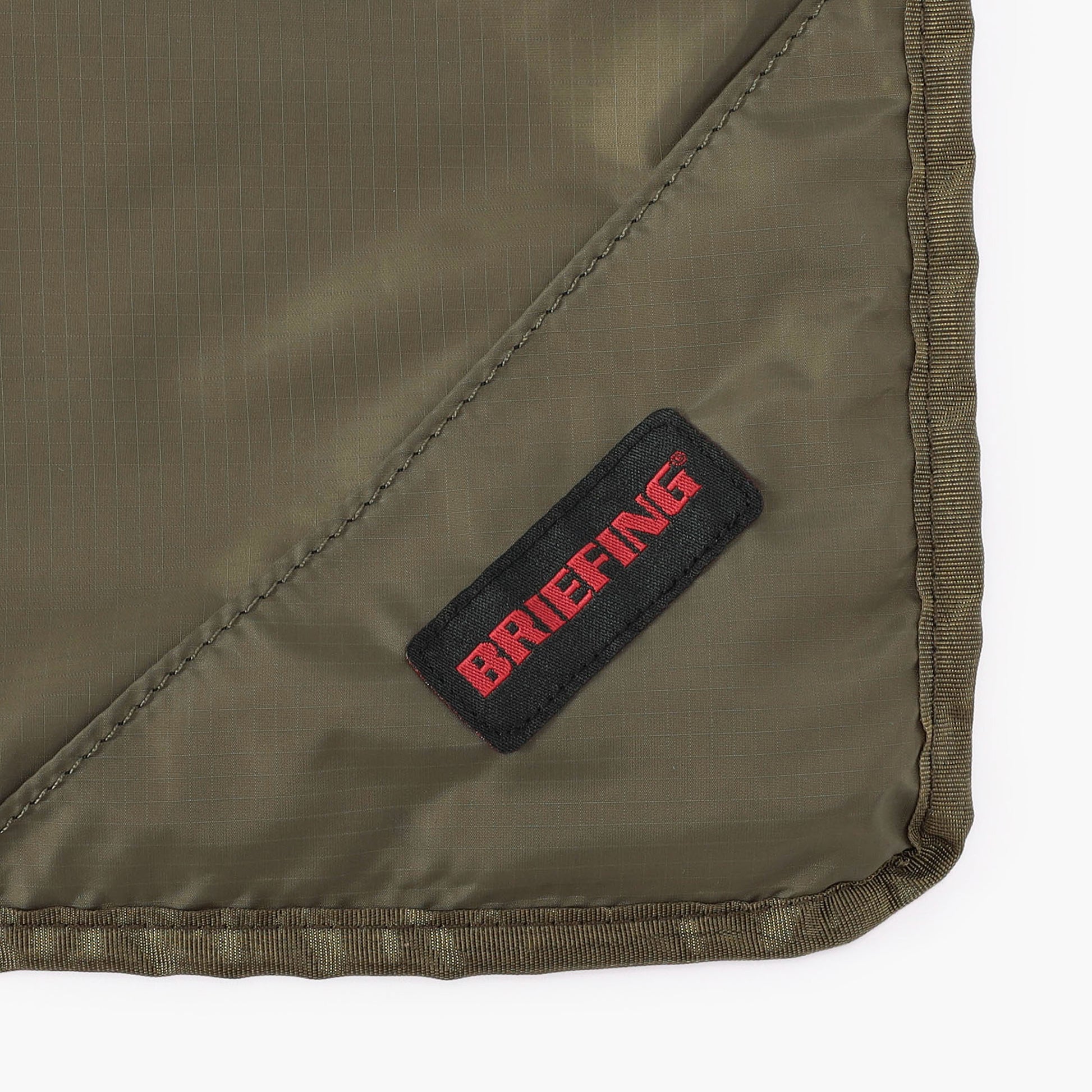BRIEFING ALL OVER LOGO PRINTED CUSHION COVER, Goods, Outdoor